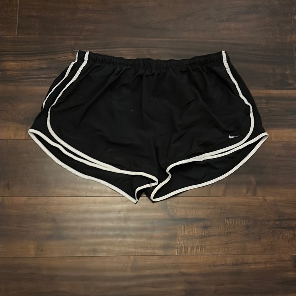 Nike Black Athletic Shorts with Curved Hem and Elastic Waistband